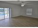 Living room with tile floors and pool view at 14716 Yorkshire Run Dr, Orlando, FL 32828