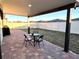 Spacious covered patio with seating area and fenced yard at 161 Andreas St, Winter Haven, FL 33881