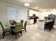 Open concept dining room adjacent to kitchen at 161 Andreas St, Winter Haven, FL 33881