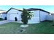 One-story house with a two-car garage and landscaping at 161 Andreas St, Winter Haven, FL 33881