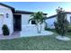 One-story home with a two-car garage and neatly landscaped yard at 161 Andreas St, Winter Haven, FL 33881