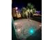 Landscaped front yard with lighting at 161 Andreas St, Winter Haven, FL 33881