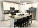 Modern kitchen with granite countertops and stainless steel appliances at 161 Andreas St, Winter Haven, FL 33881