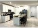 Modern kitchen with granite countertops and stainless steel appliances at 161 Andreas St, Winter Haven, FL 33881