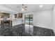 Modern kitchen with granite countertops and stainless steel appliances at 1855 Cavalier Ct, Kissimmee, FL 34744