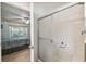 Bathroom with shower and access to bedroom at 200 Grand Canal Dr, Kissimmee, FL 34759