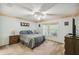 Bedroom with large window and ceiling fan at 200 Grand Canal Dr, Kissimmee, FL 34759