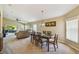 Open dining room with view into the living room at 200 Grand Canal Dr, Kissimmee, FL 34759