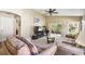 Spacious living room with comfy seating and a large TV at 200 Grand Canal Dr, Kissimmee, FL 34759