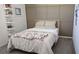 Charming bedroom with a metal bed frame and neutral decor at 2914 Scarlett Dr, Saint Cloud, FL 34772