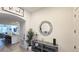 Bright and spacious entryway with a large mirror and view into the living area at 2914 Scarlett Dr, Saint Cloud, FL 34772