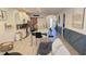 Modern kitchen with white cabinets, stainless steel appliances, and an island at 2914 Scarlett Dr, Saint Cloud, FL 34772