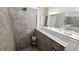 Spacious walk-in shower with neutral-toned tile and glass enclosure at 2914 Scarlett Dr, Saint Cloud, FL 34772