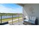 Spacious balcony with lake view and comfortable seating at 3151 Paradox Cir # 201, Kissimmee, FL 34746