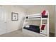 Cozy bedroom with a bunk bed, ideal for children or guests at 3151 Paradox Cir # 201, Kissimmee, FL 34746