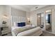 Spacious bedroom with a king-size bed and elegant decor at 3151 Paradox Cir # 201, Kissimmee, FL 34746