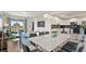 Bright dining area with large marble table and modern chairs at 3151 Paradox Cir # 201, Kissimmee, FL 34746