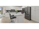 Modern kitchen featuring white cabinets and stainless steel appliances at 3151 Paradox Cir # 201, Kissimmee, FL 34746