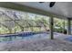 Screened pool area with patio and seating at 4437 Azure Isle Way, Kissimmee, FL 34744