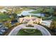 Aerial view of community clubhouse and golf course at 9778 Bucklow Hill Dr, Orlando, FL 32832
