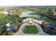 Aerial view of community clubhouse and golf course at 9778 Bucklow Hill Dr, Orlando, FL 32832