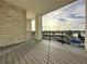 Private balcony with composite decking and lake view at 9778 Bucklow Hill Dr, Orlando, FL 32832
