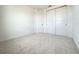 Spacious bedroom with double doors leading to closet at 9778 Bucklow Hill Dr, Orlando, FL 32832