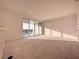 Bright bedroom with large sliding glass doors leading to a balcony at 9778 Bucklow Hill Dr, Orlando, FL 32832