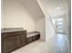 Entryway with built-in bench seating and cabinetry, perfect for storage at 9778 Bucklow Hill Dr, Orlando, FL 32832