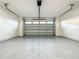 Two-car garage featuring an automatic garage door opener at 9778 Bucklow Hill Dr, Orlando, FL 32832