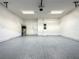 Finished two-car garage with epoxy flooring at 9778 Bucklow Hill Dr, Orlando, FL 32832