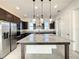 Bright kitchen boasts granite countertops and stainless steel appliances at 9778 Bucklow Hill Dr, Orlando, FL 32832