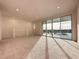 Bright loft features sliding glass doors leading to a balcony at 9778 Bucklow Hill Dr, Orlando, FL 32832