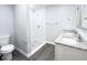 Bathroom with a walk-in shower and granite countertops at 1030 Darlington Ct, Kissimmee, FL 34758