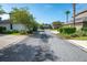 Residential street view with houses, garages, and landscaping at 13913 Hahn Ln, Orlando, FL 32827