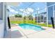 Inviting screened pool and spa area at 1648 Moon Valley, Davenport, FL 33896