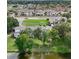 Aerial view of townhouses by the lake at 210 Majors Ln # A, Kissimmee, FL 34743