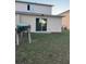 Backyard with patio and canoe at 210 Majors Ln # A, Kissimmee, FL 34743