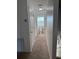 Clean bathroom with toilet and access to another room at 210 Majors Ln # A, Kissimmee, FL 34743