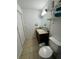 Clean bathroom with vanity, toilet, and shower at 210 Majors Ln # A, Kissimmee, FL 34743