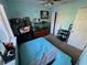 Bedroom with a bed, fish tank and gaming setup at 210 Majors Ln # A, Kissimmee, FL 34743