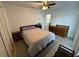 Bedroom with a double bed and wooden dresser at 210 Majors Ln # A, Kissimmee, FL 34743