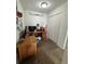 Home office with desk, computer, and built-in closet at 210 Majors Ln # A, Kissimmee, FL 34743