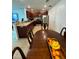Kitchen with dark wood cabinets and granite countertops at 210 Majors Ln # A, Kissimmee, FL 34743
