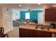 Kitchen with granite countertops and dark brown cabinets at 210 Majors Ln # A, Kissimmee, FL 34743