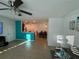 Open floor plan with living room, kitchen, and dining area at 210 Majors Ln # A, Kissimmee, FL 34743