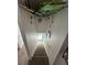 Indoor staircase with surfboard decor and wall art at 210 Majors Ln # A, Kissimmee, FL 34743