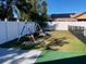 Spacious backyard with grassy area and a playset at 2213 Rio Pinar Lakes Blvd, Orlando, FL 32822