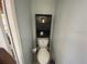 Small bathroom with toilet and storage cabinet at 2213 Rio Pinar Lakes Blvd, Orlando, FL 32822