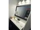 Small bathroom with a vanity and a large mirror at 2213 Rio Pinar Lakes Blvd, Orlando, FL 32822